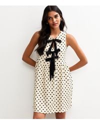 New Look - Cream Textured Polka Dot Tie Front Mini Dress - Lyst