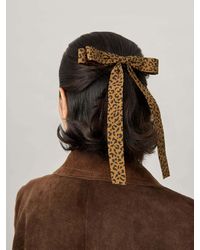 Aela - Skinny Leopard Print Bow - Lyst