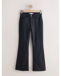 Next - Coated Denim Skinny Flare Jeans - Lyst
