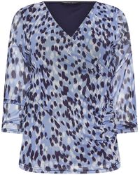 M Com - Petite 3/4 Sleeve Mesh Wrap Top - Lyst