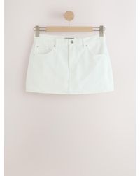 Next - Denim Mini Skort - Lyst