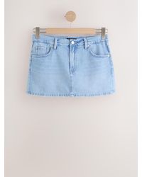 Next - Denim Mini Skort - Lyst