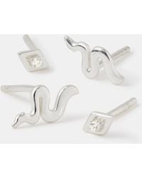 Accessorize - 2-Pack Snake & Eye Stud Earrings - Lyst