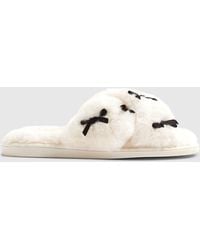 River Island - Plush Cross Strap Embroidered Bow Slippers - Lyst
