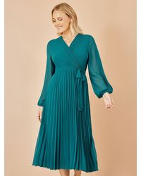 Yumi' - Pleated Wrap Midi Dress With Sheer Long Sleeves - Lyst