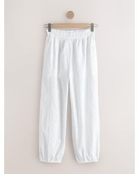 Next - Broderie Balloon Leg Trousers - Lyst