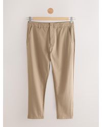 Next - Neutral Stone Active Golf Chino Trousers - Lyst