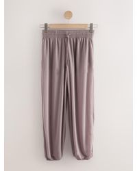 Next - Mauve Sheer Balloon Leg Tie Waist Trousers - Lyst