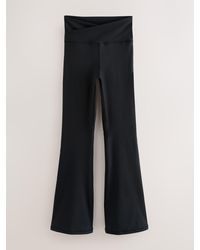 Next - Active Balance Wrap Front Flared Leggings - Lyst
