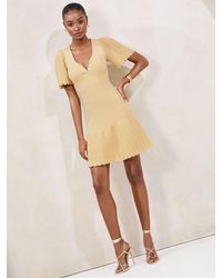 Lipsy - Petite Knitted Metallic Sparkle Dropped Waist V-Neck Flute Sleeve Mini Dress - Lyst