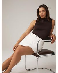 Next - Hourglass Denim Mini Skort - Lyst