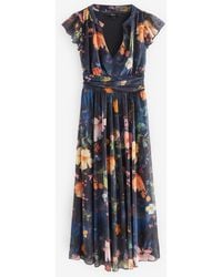 Next - Pleated Mesh V-Neck Occasion Maxi Dress - Lyst