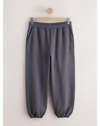 Next - Charcoal Cuffed Balloon Joggers - Lyst