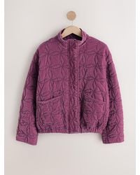 Next - Velvet Funnel Neck Quilted Jacket - Lyst