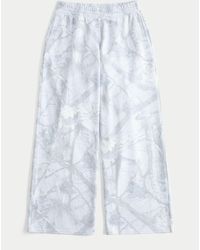 Hollister - Low Rise Baggy Doe Print Joggers - Lyst