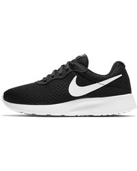 ladies black nike tanjun trainers