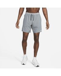 Nike - Shorts da running 2 in 1 18 cm dri-fit stride - Lyst
