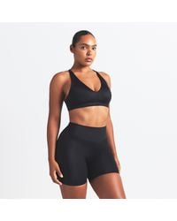 Nike - Skims Shine V-Neck Bra - Lyst