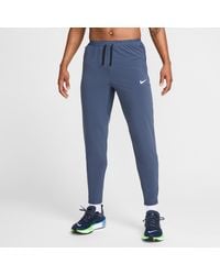 Nike - Stride Dri-Fit Woven Running Trousers - Lyst