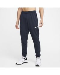 Nike - Pantaloni fitness dri-fit affusolati in fleece dry - Lyst