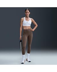 Nike - Leggings A Tutta Lunghezza A Vita Alta Con Tasche E Sostegno Medio Universa – Donna - Lyst