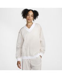 Nike - Sportswear Essential Loose Uv Woven Long-Sleeve V-Neck Top - Lyst