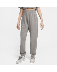 Nike - Pantaloni ampi in fleece sportswear - Lyst