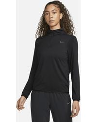 Nike - Top da running con zip a 1/4 e protezione uv swift - Lyst