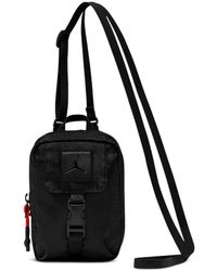 black nike satchel