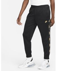 nike pinstripe joggers