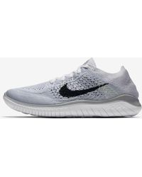 Nike Free Rn Flyknit Sneakers for Women - Up to 24% off at Lyst.com