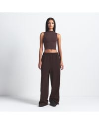 Nike - Skims Vintage Seamless Mock-Neck Long-Line Bra - Lyst