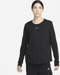 Nike - T-shirt a manica lunga sportswear premium essentials - Lyst