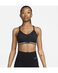 Nike - Bra imbottito a sostegno leggero con scollo a v indy - Lyst