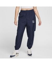 Nike - Sportswear Geweven joggingbroek - Lyst