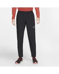 nike running essential woven sweatpants in black