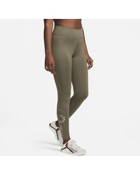 Nike - Therma-fit One Mid-rise Graphic Training leggings Polyester - Lyst