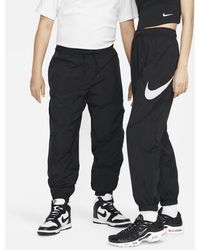 Nike - Sportswear Essential Mid-rise Pants - Lyst