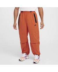 Nike - Tech Woven Oversized Trousers - Lyst