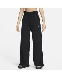 Nike - Pantaloni confortevoli in fleece a gamba larga e vita alta sportswear phoenix plush - Lyst