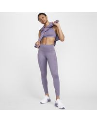 Nike - Leggings a 7/8 a vita alta con tasche e sostegno elevato go - Lyst