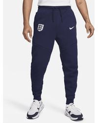Nike - England Tech Fleece Football joggers - Lyst