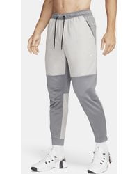 Nike - Unlimited Water-repellent Zippered Cuff Versatile Pants - Lyst