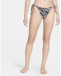 Nike - Swim Swirl String Bikini Bottom - Lyst