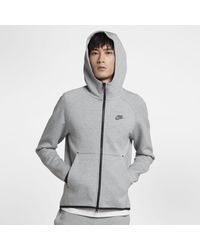 green nike tech suit