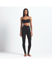 Nike - Skims Shine High-Waisted 26" Stirrup Leggings With Drawcord - Lyst