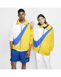 Nike Giacca in woven con Swoosh Sportswear - Metallizzato