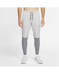 Nike Synthetic Swift Men's 27" Running Pants in Blue for Men - Lyst