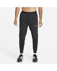 nike essential run division hybrid running pants