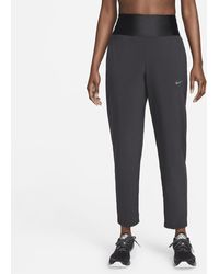 Nike - Dri-fit Swift Mid-rise Running Pants - Lyst